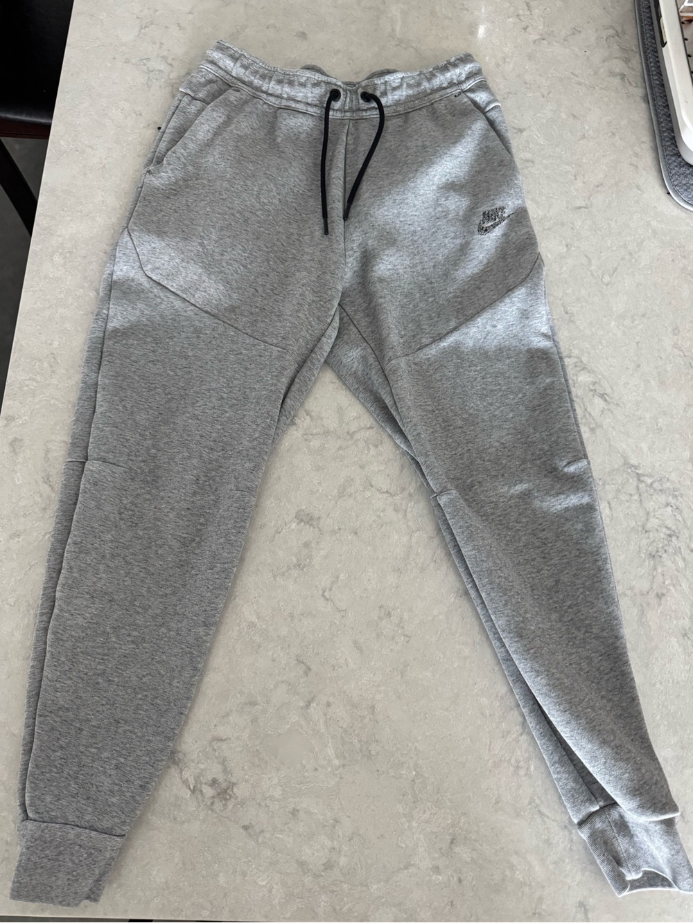 Nike Women’s Light Gray Fleece Joggers with Black Drawstring